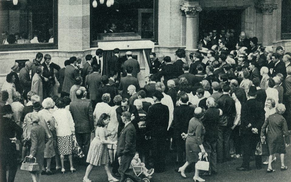 A crowd outside the Barclays Bank branch in Enfield at the unveiling of its cash machine in June 1967
