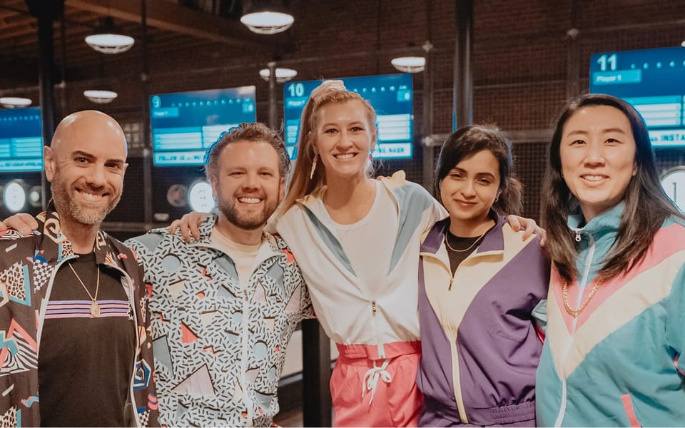 Five Chainguard employees at a company event