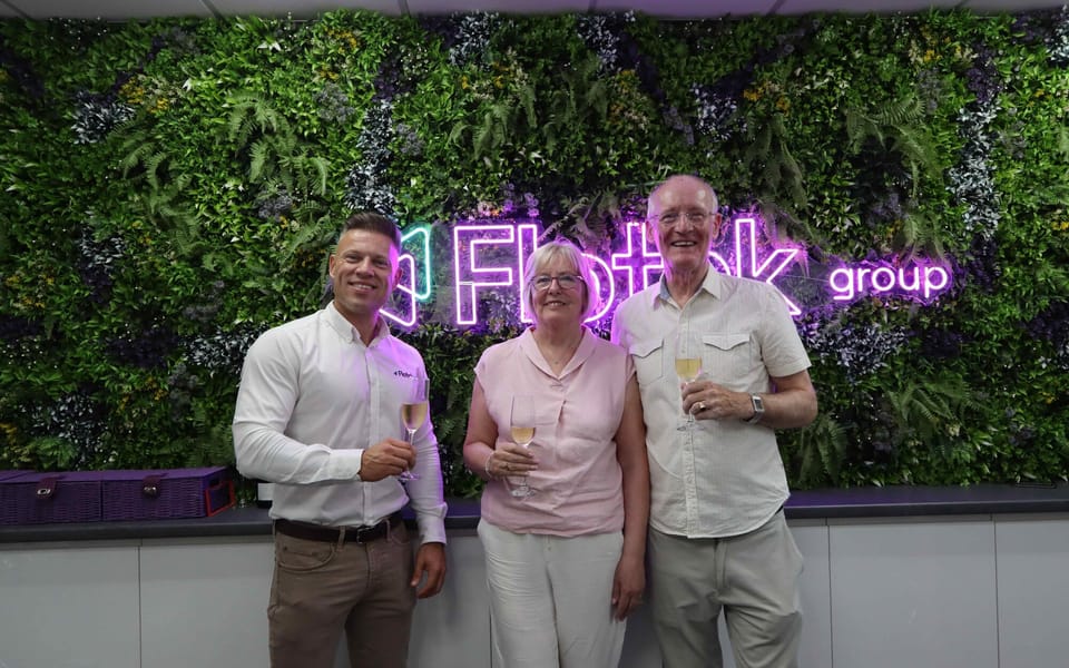 Jay Ball, chief executive of Flotek Group, with Clear Telecom co-owners Barbara and John Malone