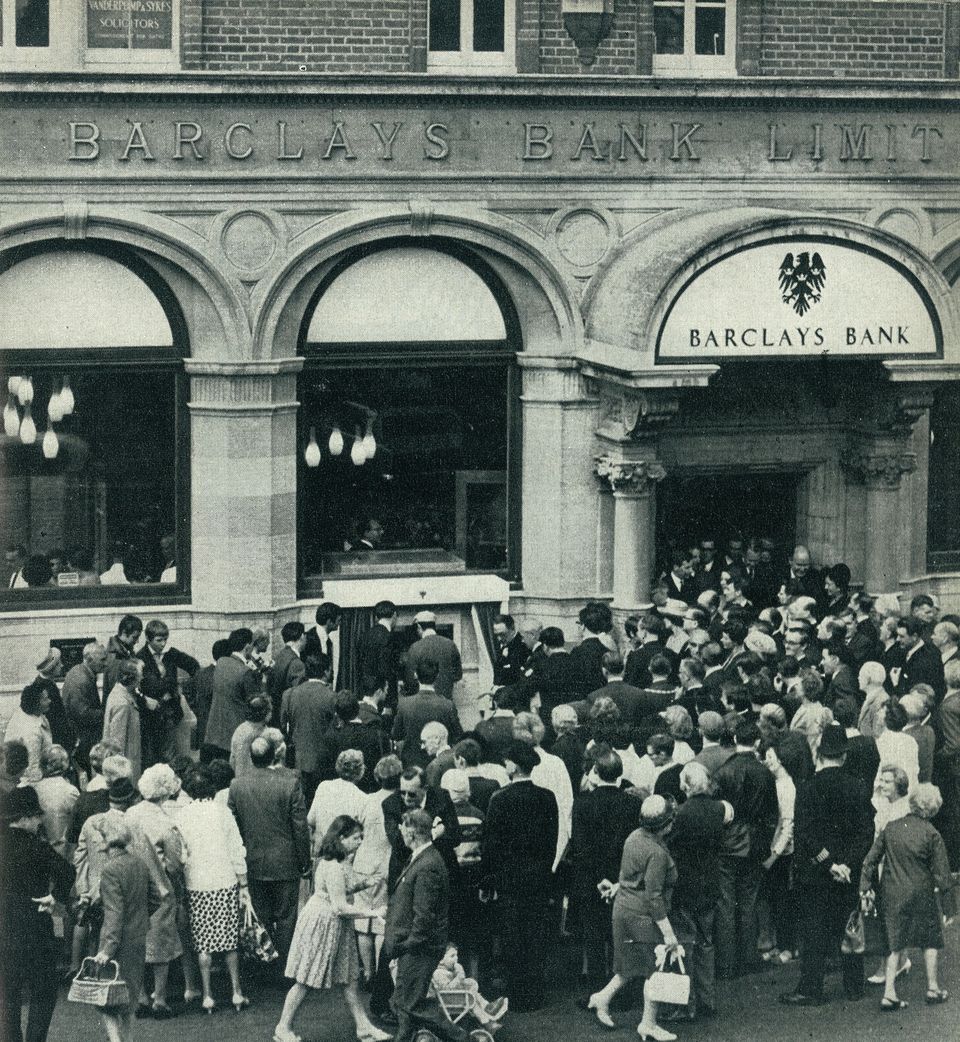 A crowd outside the Barclays Bank branch in Enfield at the unveiling of its cash machine in June 1967