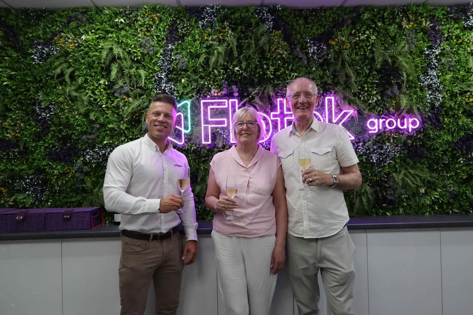 Jay Ball, chief executive of Flotek Group, with Clear Telecom co-owners Barbara and John Malone
