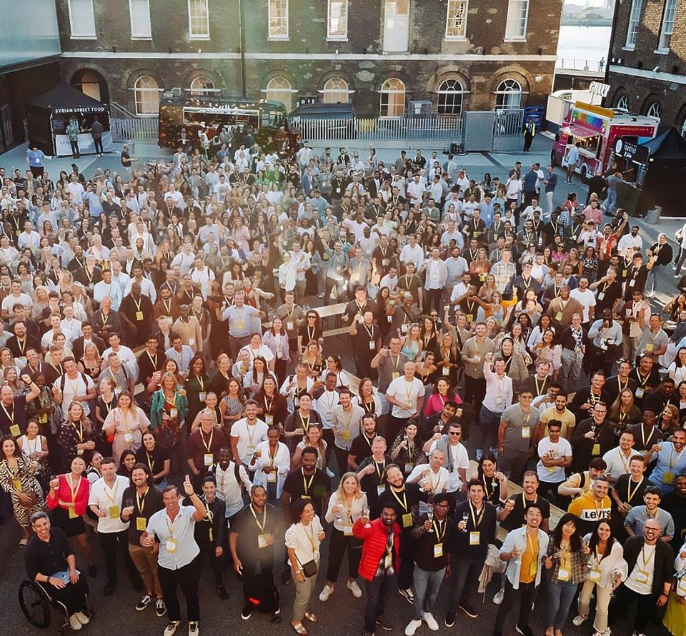 GoCardless staff gathered in a London courtyard