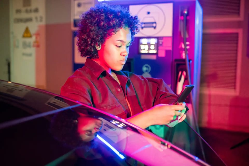 An IT professional using a tablet in a data centre
